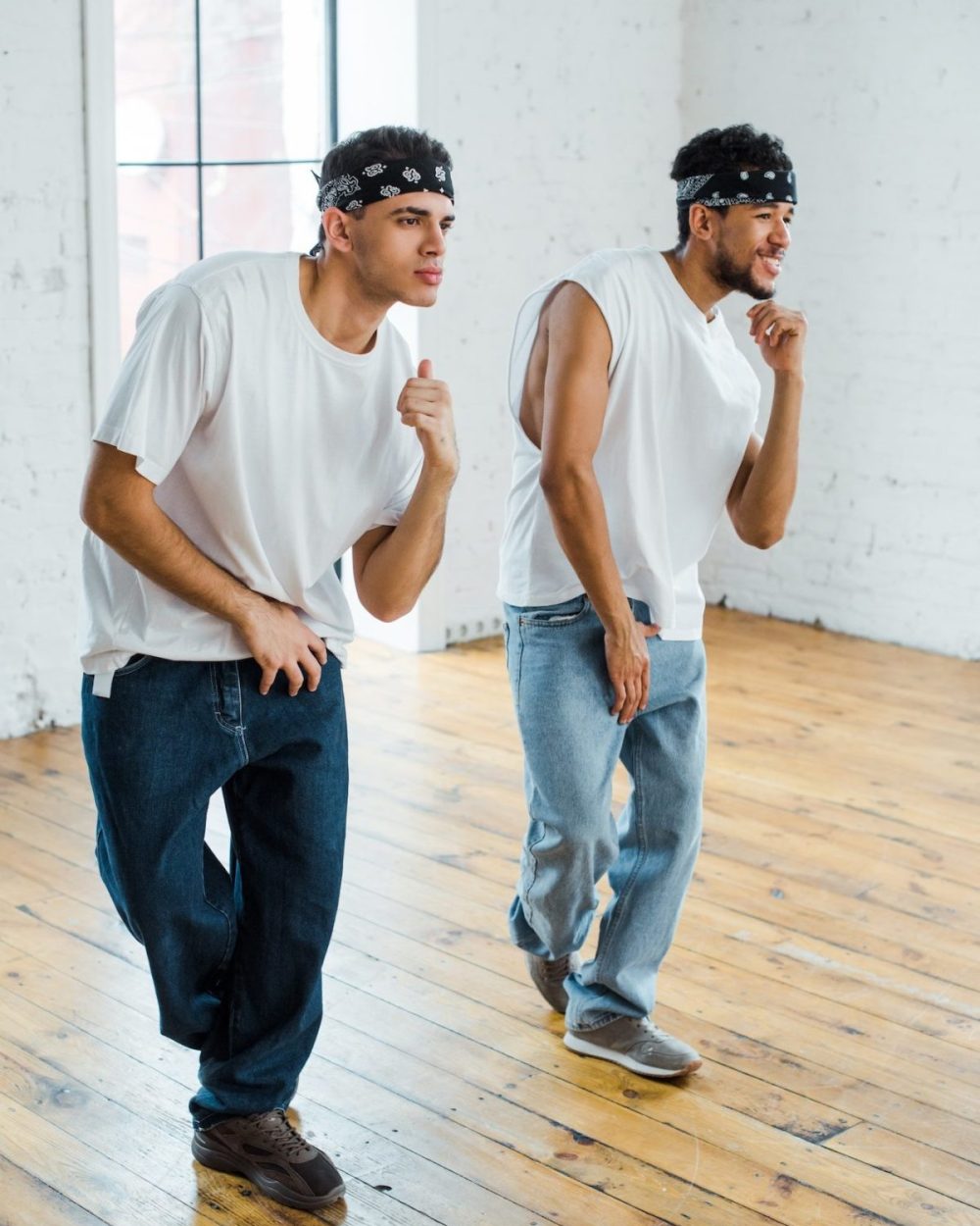 handsome-multicultural-dancers-in-headbands-dancing-hip-hop-e1684994207802.jpg