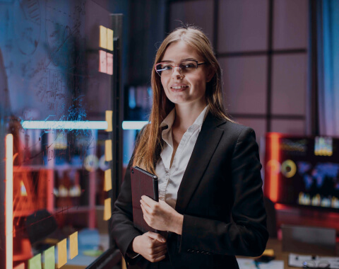 female-executive-manager-holding-tablet-computer-2022-05-30-19-19-46-utc-c-1.jpg