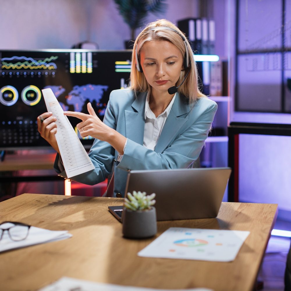 business-woman-using-headset-and-laptop-for-video-call.jpg