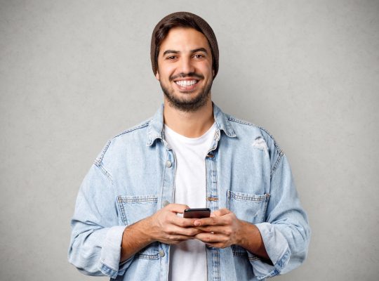 handsome-millennial-guy-with-smartphone-2021-11-03-18-11-16-utc.jpg