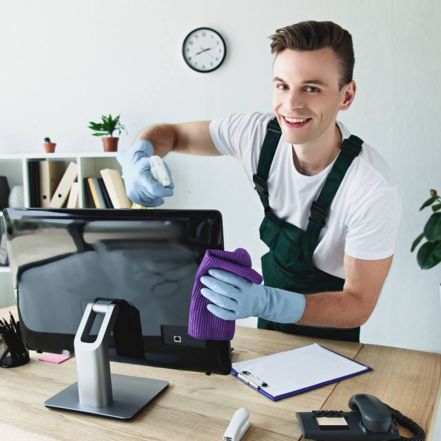 handsome-young-cleaner-in-rubber-gloves-cleaning-c-2021-09-01-01-56-48-utc.jpg