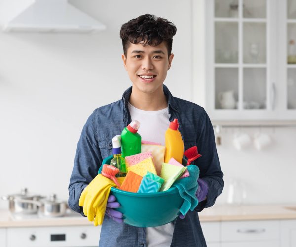 smiling-asian-guy-house-keeper-cleaning-apartment-2021-09-03-14-20-57-utc.jpg