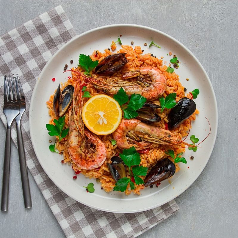 seafood-paella-shrimp-and-mussels-risotto-rice-homemade-top-view-no-people-.jpg