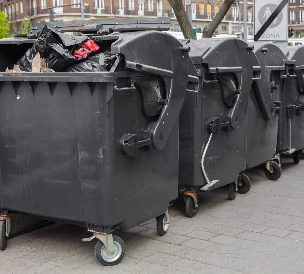 black-plastic-dumpster-street-large-garbage-containers.jpg