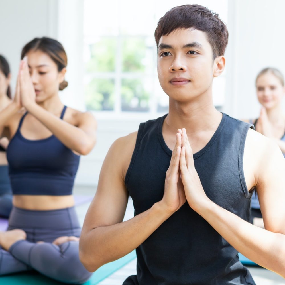 group-of-people-meditating-in-yoga-class.jpg